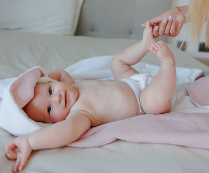 Muslin and bamboo towel with a hood